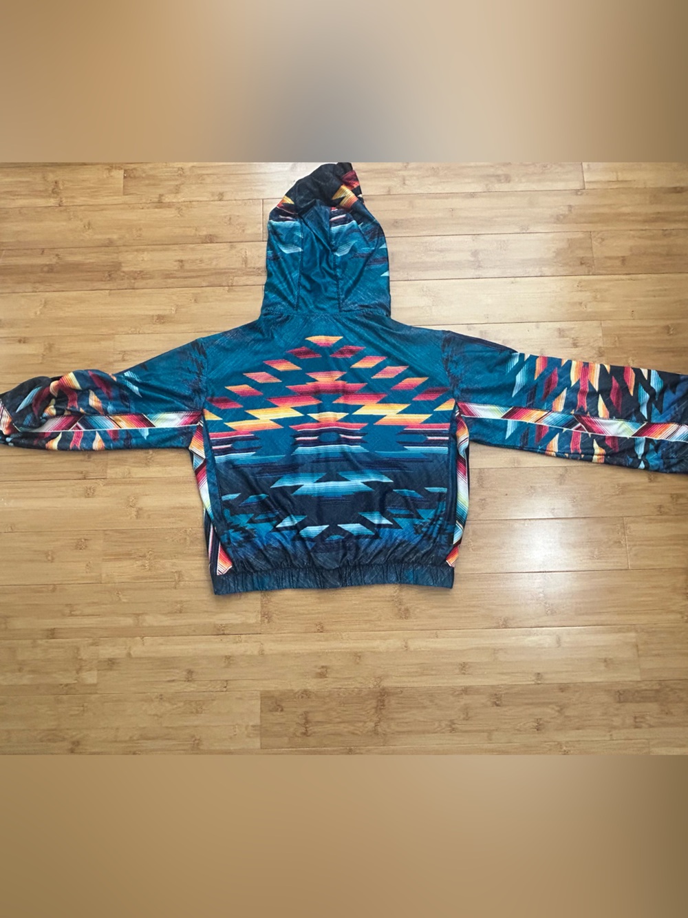Lucky in Love Teal Aztec-Print Hooded tennis zip up.